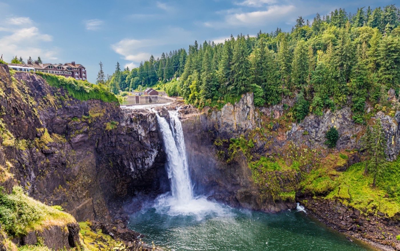 Snoqualmie Falls, surrounded by evergreen forest